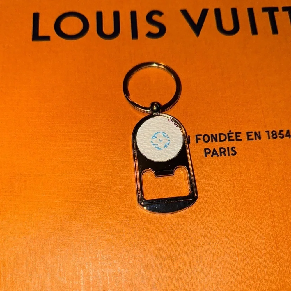 L V luxcycled Mirkami Silver Key chain bottle opener sku-1027